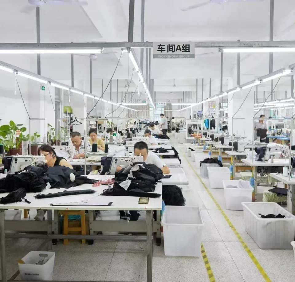 Sewing team working on garments in Workshop A at Naishi Clothes Factory